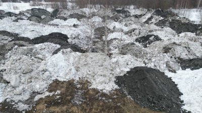 Экологи обнаружили нелегальный полигон черного снега в городе-бедоносце